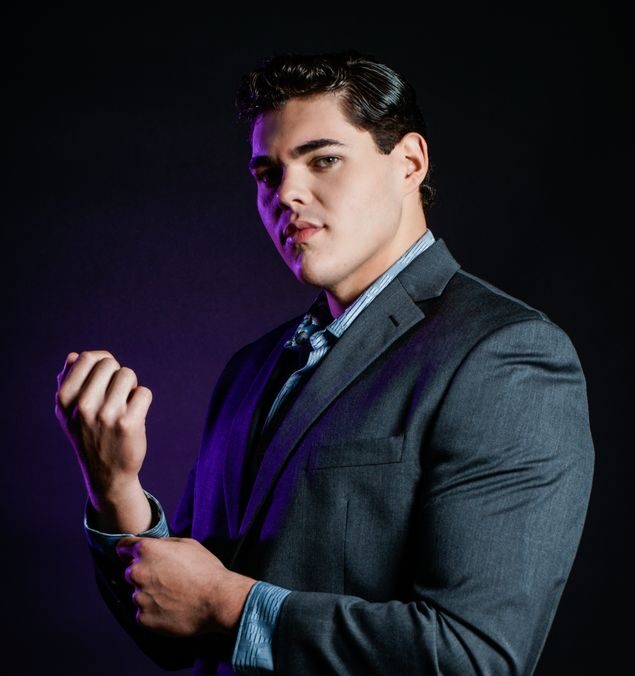 Model discussing portfolio with agency representative