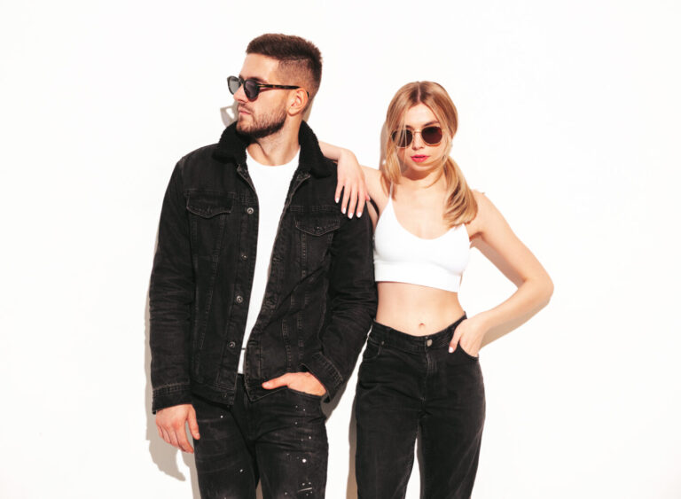 Sexy confident beautiful woman and her handsome boyfriend. Happy cheerful family having tender moments. Young passionate couple hugging. Sensual pair isolated